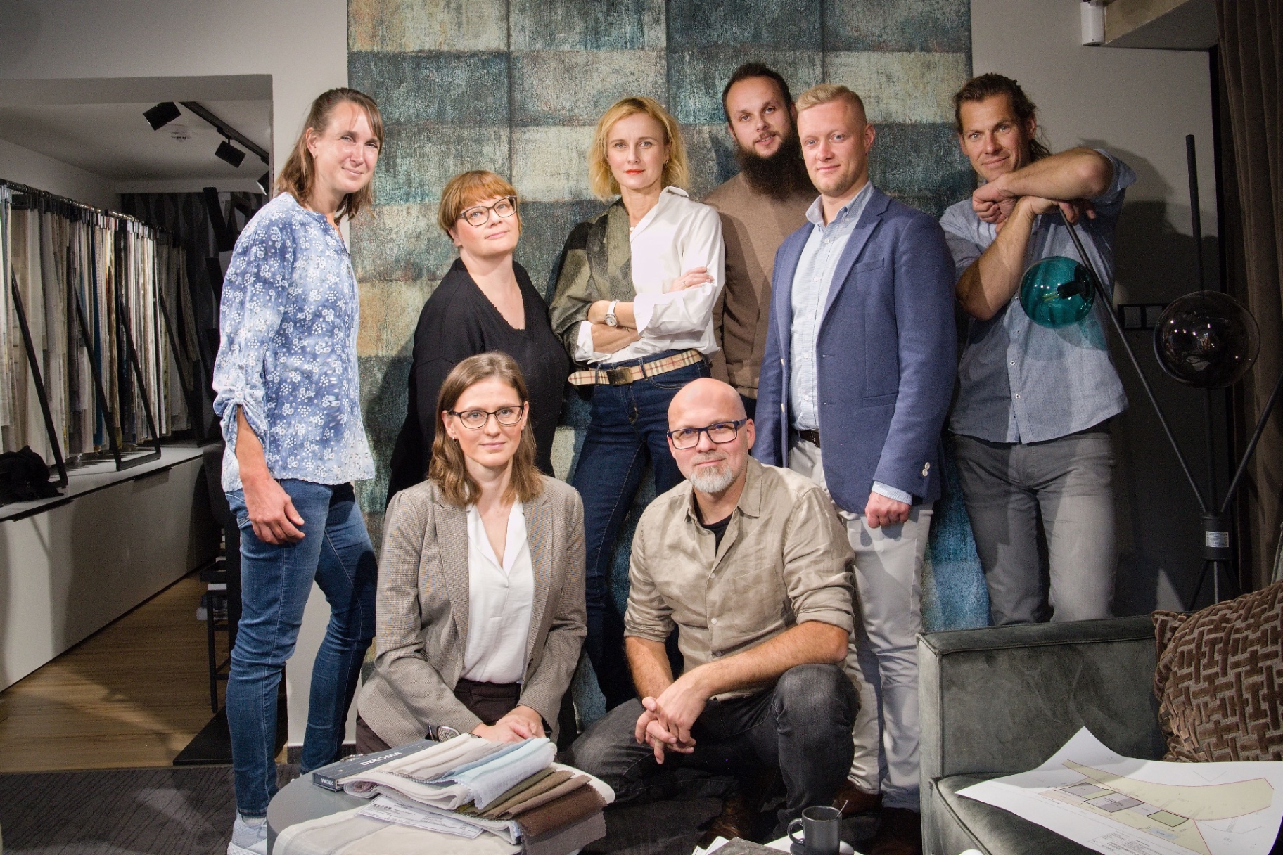 Portrait of an interior design team in their showroom